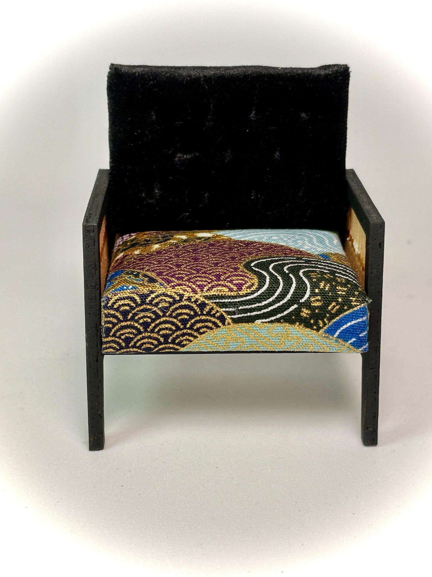 1:12 Dollhouse wooden Art Deco rattan armchair black and geometric blue